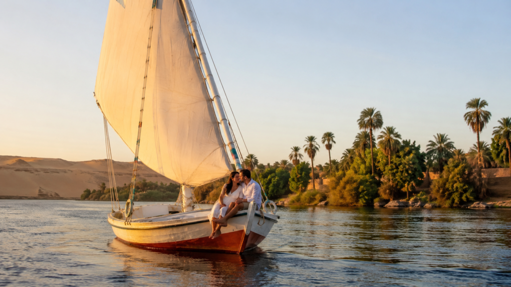 Romantic Aswan felucca ride during an Egypt honeymoon